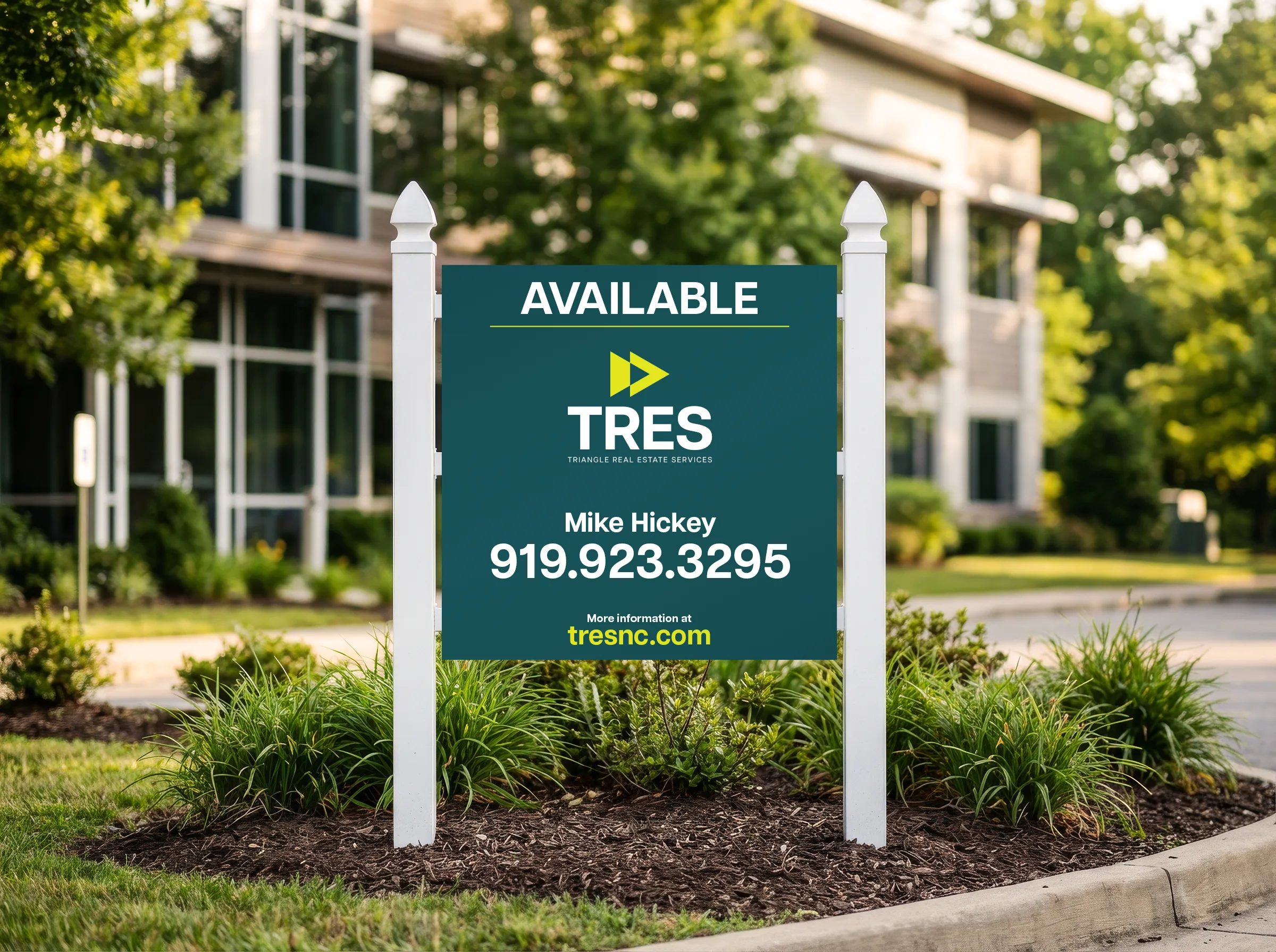 TRES yard sign in front of a commercial building