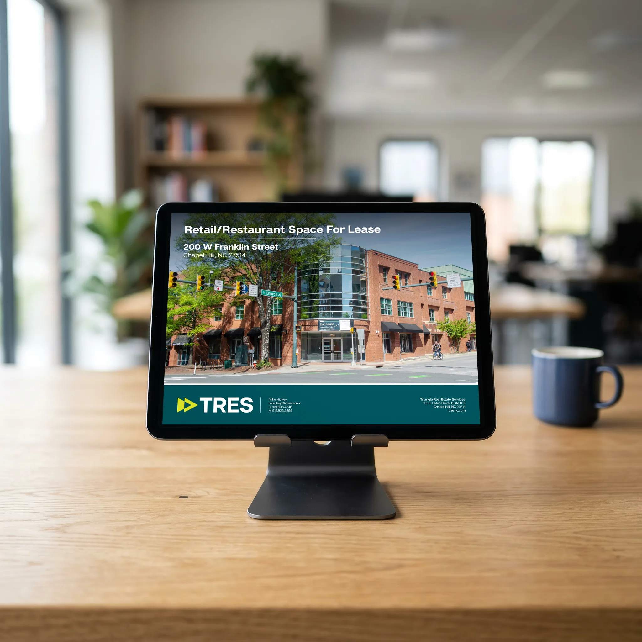 TRES property flyer shown on a tablet